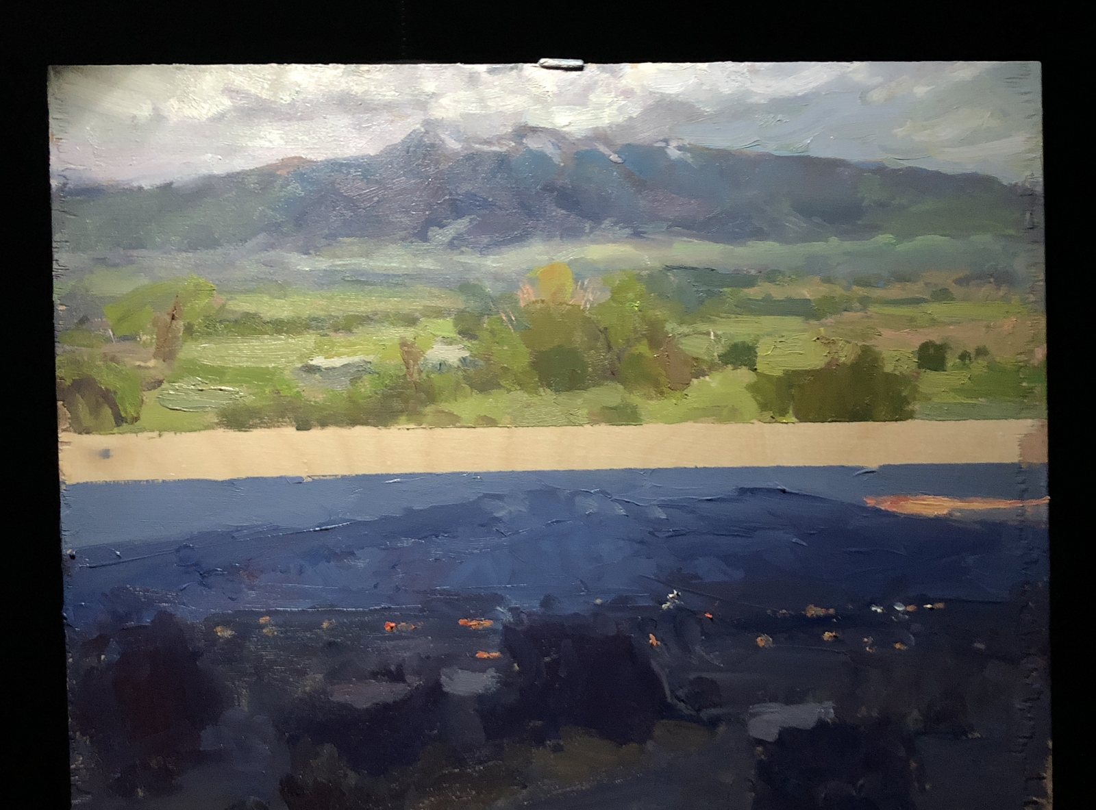 Two night studies on one board: the valley at dusk above, the same valley after dark below