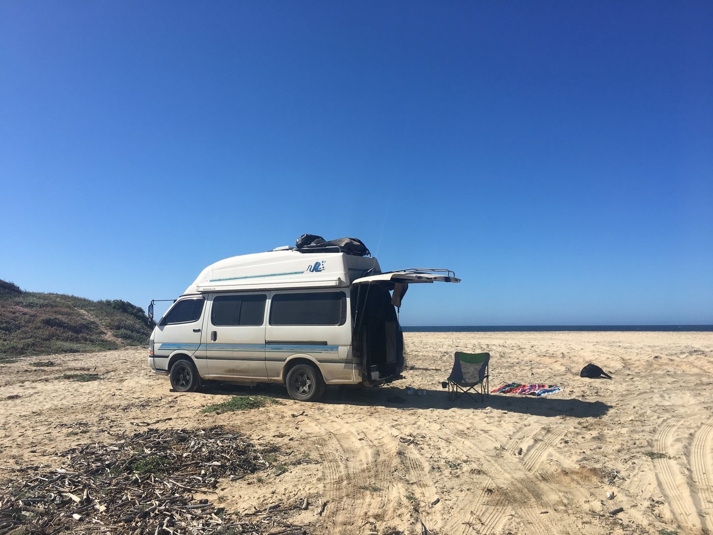 The van on the beach at El Pescadero, doors open